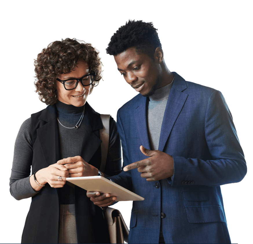 A woman and a man look at a tablet together, the man pointing at it.